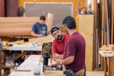 Students work with instructors at the Northwest School of Wooden Boatbuilding, in Port Townsend, Washington on July 25, 2023. The NSWB has been in operation of over 40 years, teaching students wooden boatbuilding skills and helping launch careers in that industry.